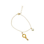 Gold plated bracelet with key and pearl