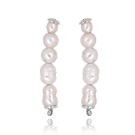 Row of silver earrings with irregular natural pearls