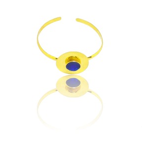 Silver textured handcuff gilded with two concentric circles and enamel in the center